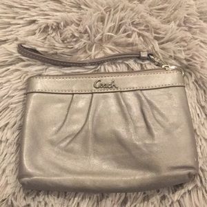 Coach gunmetal color wristlet. Gently used.